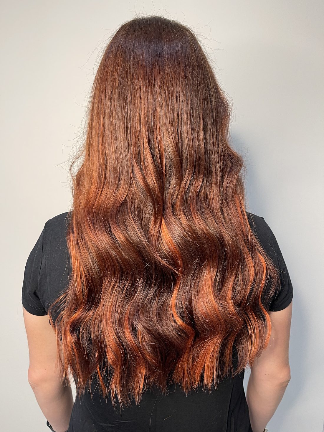 Extension su capelli ramati mossi